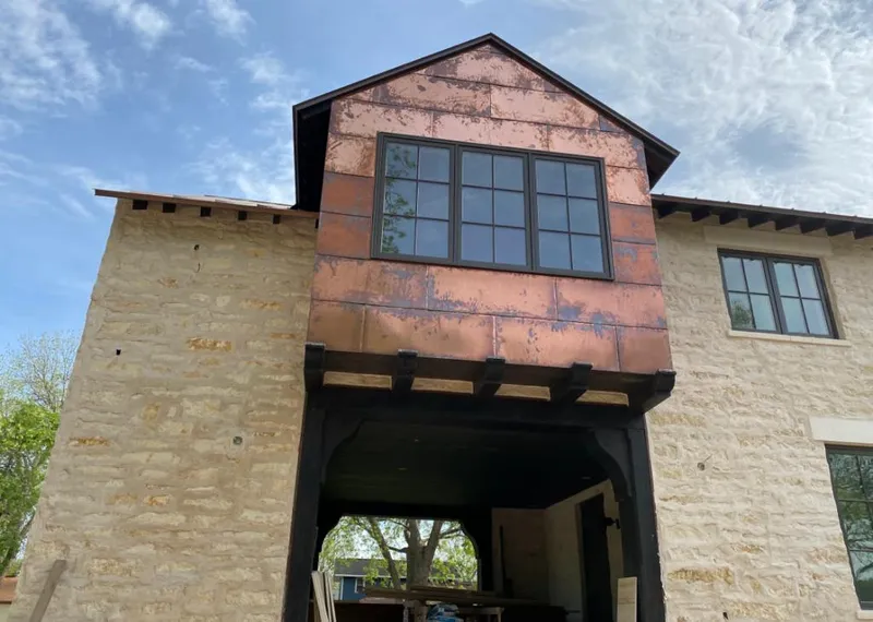Copper metal panel facade on a stone building for Metal Roof Coating in Massillon